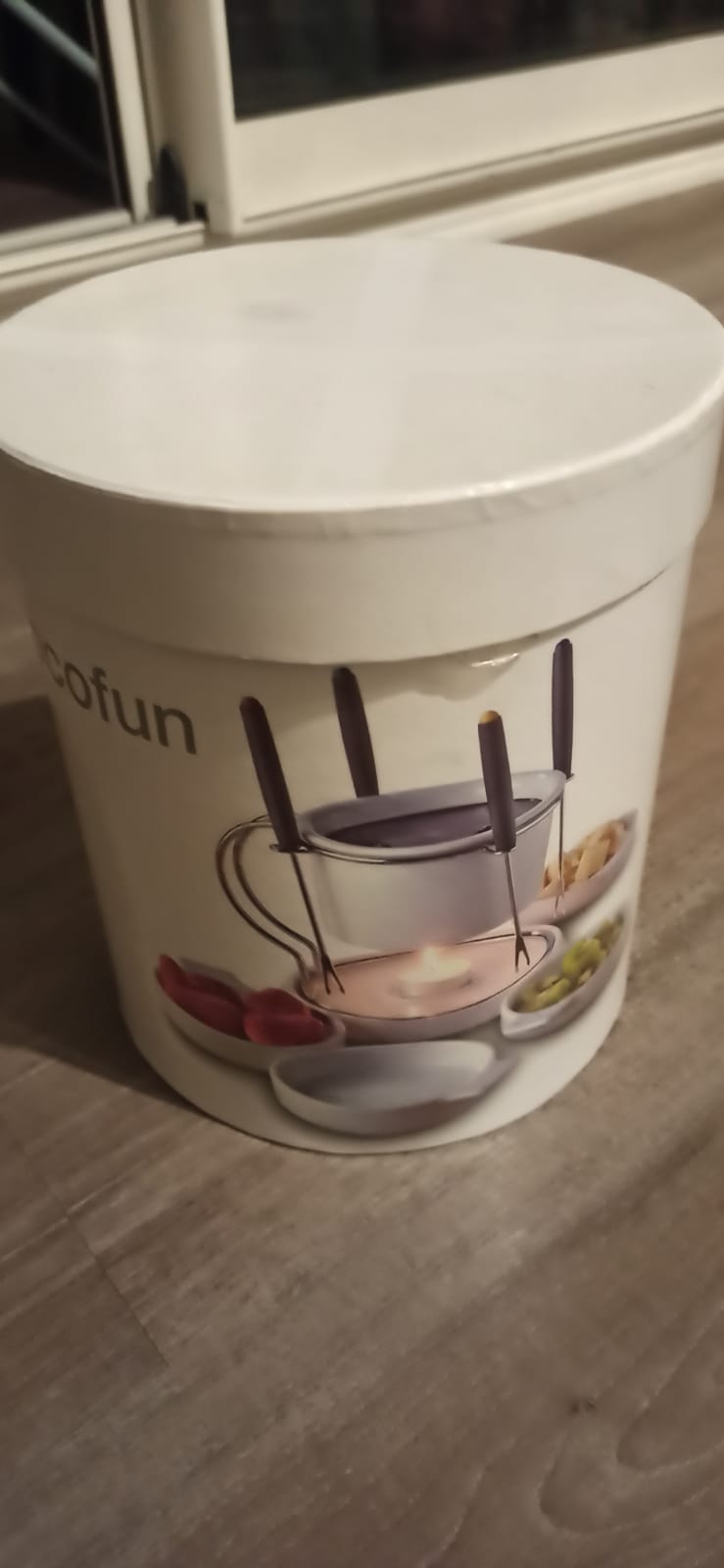 A boxed chocolate fondue set collected for free