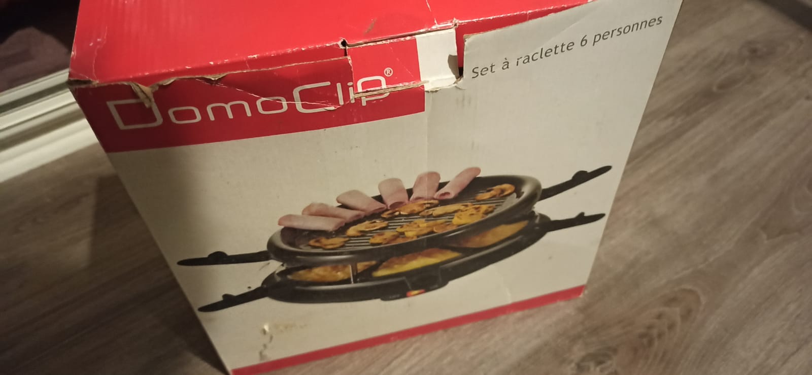 A boxed six-person raclette set collected for free